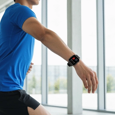 Person exercising with a smartwatch, showing health metrics